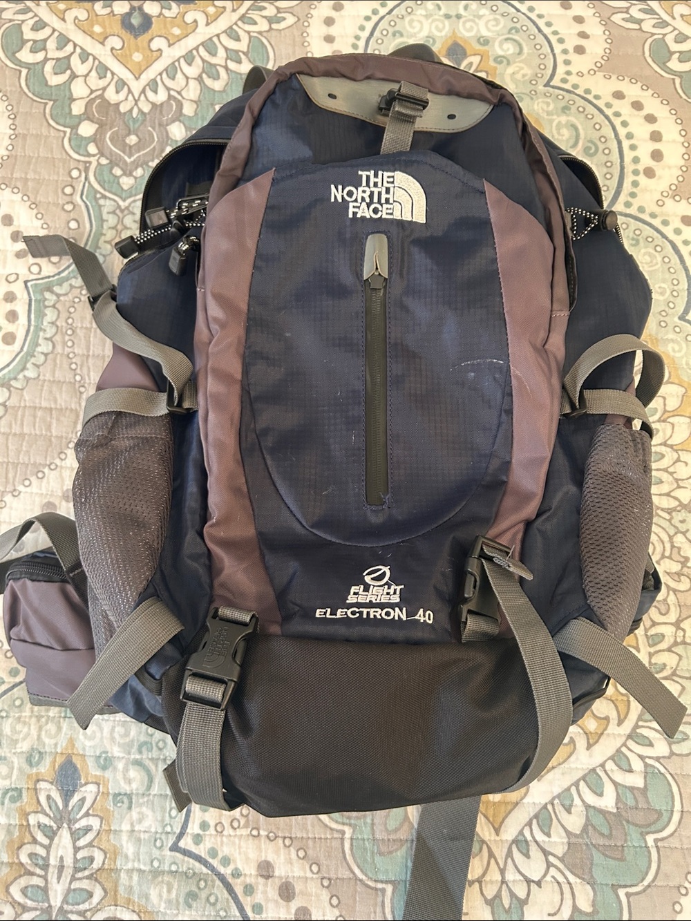 The North Face Electron 40 Backpack in Navy and Brown- read bottom